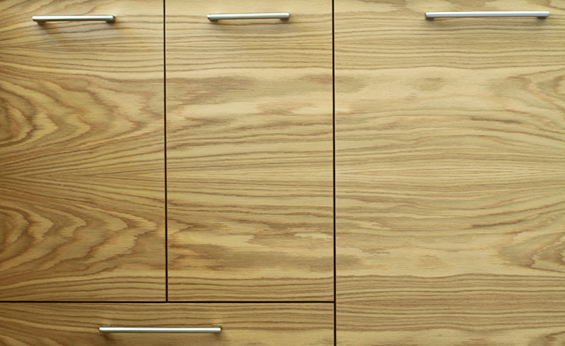 A set of brown cabinets.